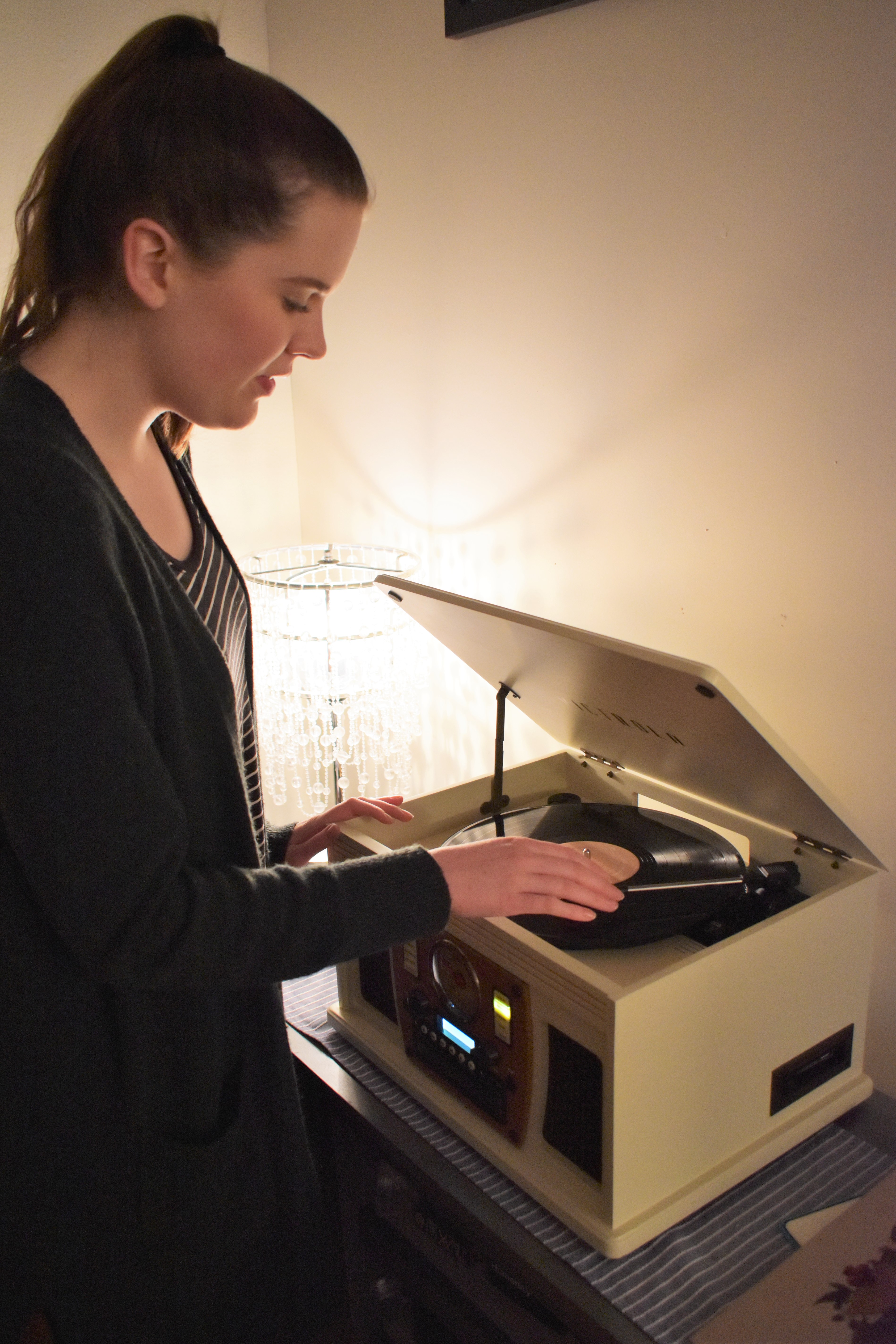 Adjusting the Shawn Mendes LP in a Victrola Record Player